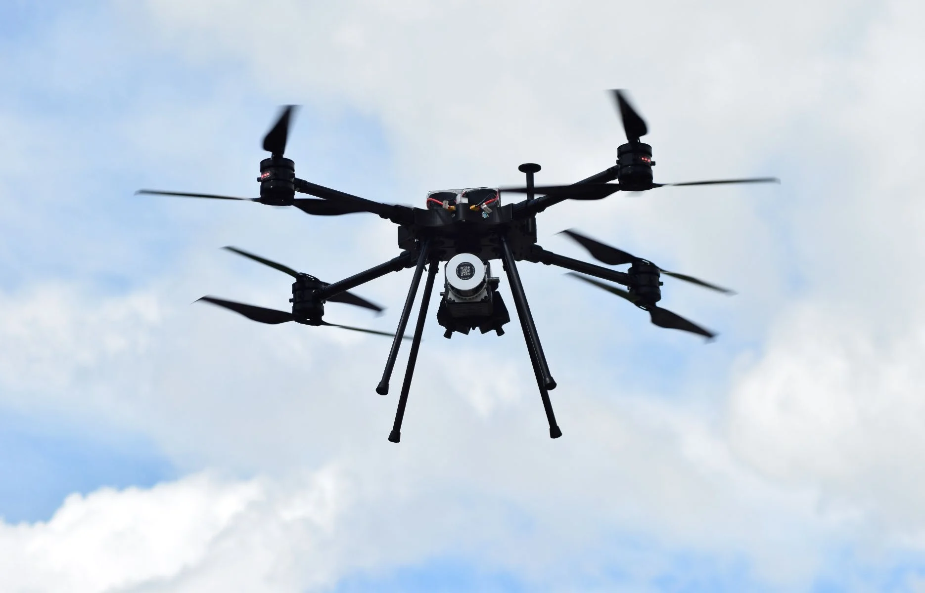 Surveyor 32 equipped industrial UAV in flight