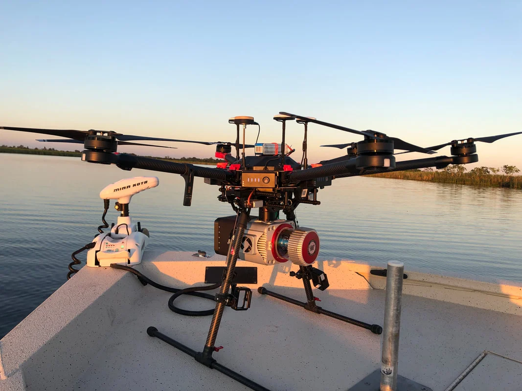LiDAR-equipped drone on a bass boat used as a takeoff platform