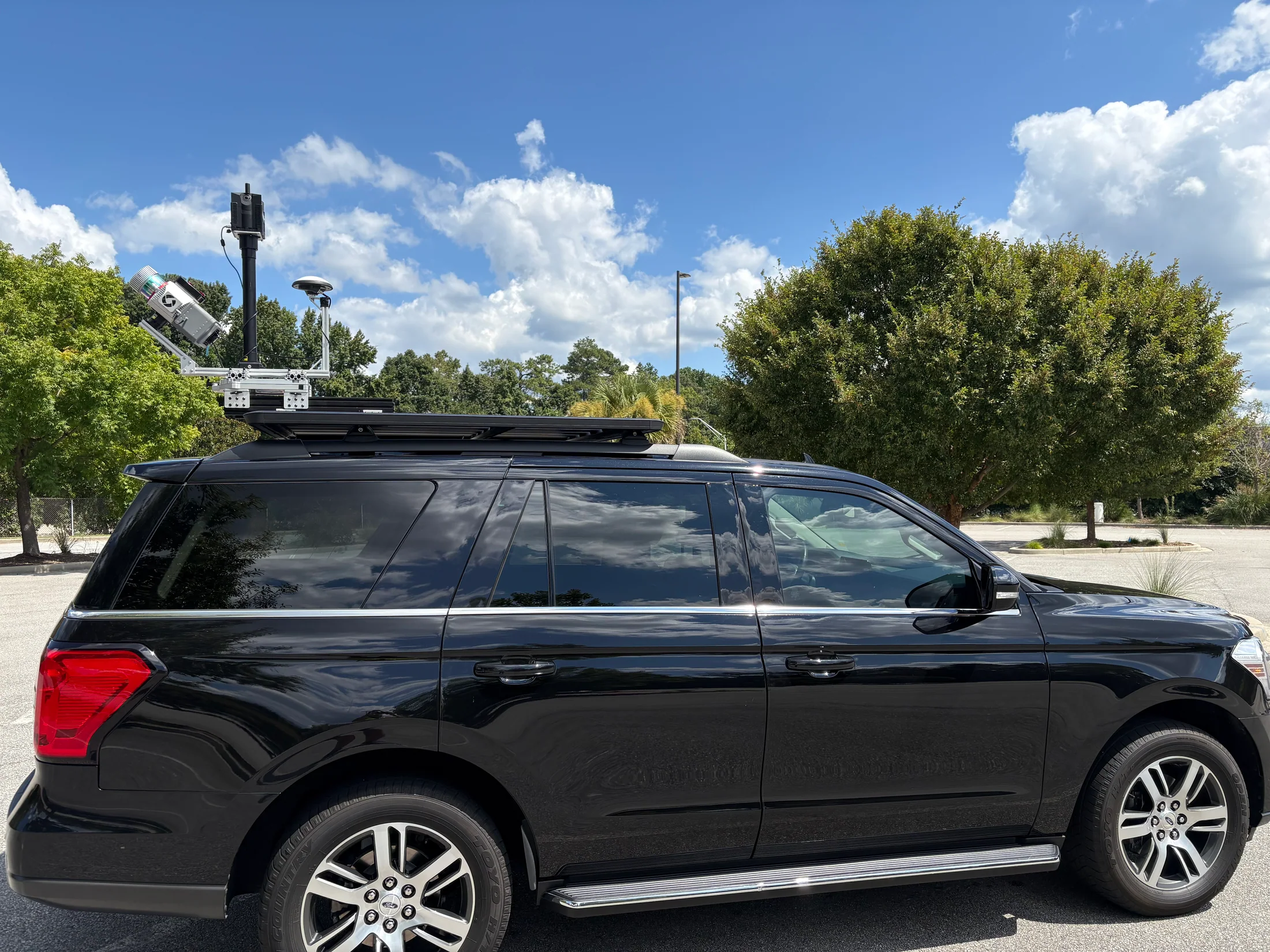Example vehicle with roof-mounted LiDAR and camera equipment for mobile mapping